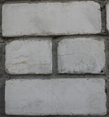 A detailed view of white brick wal
