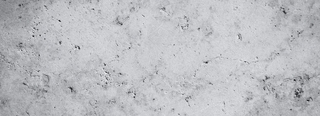 concrete grey cement wall textured weathered and cracked background. Plain monochrome web banner