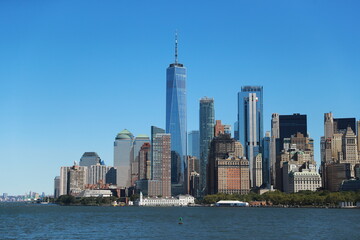 Fototapeta na wymiar A view of One World Trade Center and lower Manhattan are seen on board the Staten Island Ferry.