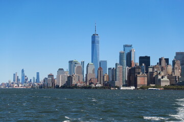 Fototapeta na wymiar A view of One World Trade Center and lower Manhattan are seen on board the Staten Island Ferry.