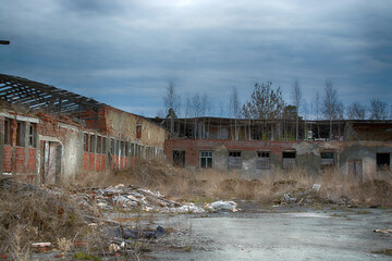Fototapeta premium destroyed buildings and debris after the war.picture of the Apocalypse.