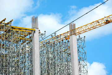 Crane and highrise construction site