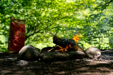 Coals in a bag in nature for a fire