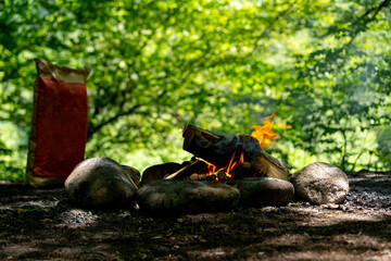 Coals in a bag in nature for a fire
