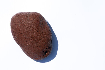 Stone on a white background as a background or texture