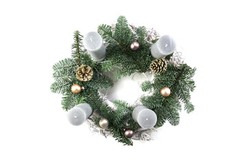 Advent wreath with fir branches, gray candles, cones and Christmas baubles isolated on a white...