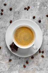 Coffee cup and coffee beans.