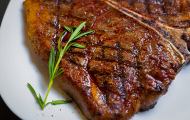 Delicious t-bone steak cooked on grill in meat restaurant