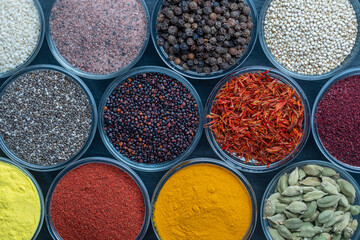 Assortment colorful spices, seeds and herbs for cooking food, top view