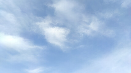 White Fluffy Clouds with Blue Sky Background. Central Java Indonesia.