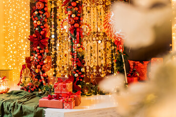 Christmas gift boxes on background bokeh lights and illumination