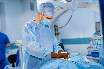 Medical instruments in neurosurgeon's hands. Operating process in hospital. Doctor is performing...