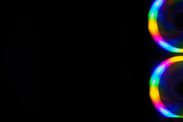 multicolored rainbow lines on black background