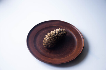 
spruce cone on the plate
