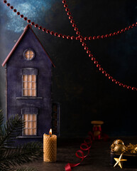 christmas card, dark background, old christmas toys, beads, candles, stars