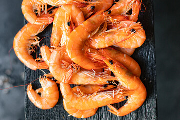 fresh shrimp seafood cooked prawn  ready to eat serving on plate healthy meal snack top view copy space for text food background rustic