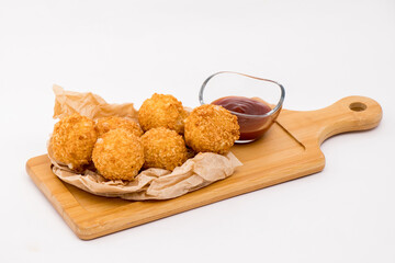 cheese balls and tomato sauce