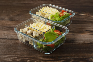 Health. Healthy food. Vegetarian diet. Raw salad. Sprouted grains. Cherry tomatoes. Couscous, salad and Turkey in glass boxes.