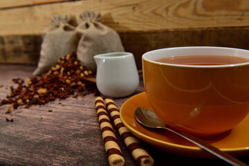 Natural Fruit tea in a yellow cup