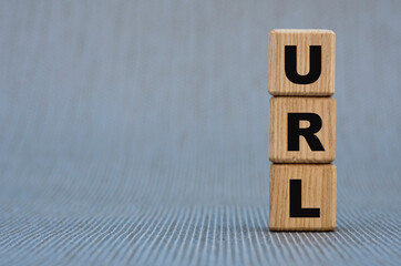 URL - word on wooden cubes on a gray background
