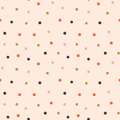 Abstract seamless pattern. Vector pattern with multi-colored dots. Modern pattern with polka dots. For the design of textiles, wrapping paper, wallpaper.