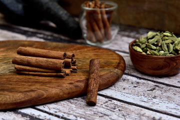 Cinnamon stick on a wooden board