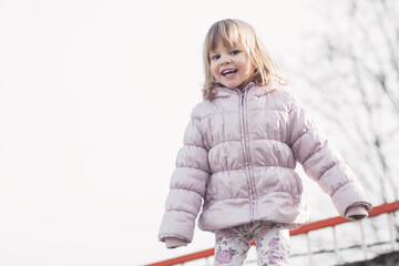 cute little girl in warm jacket