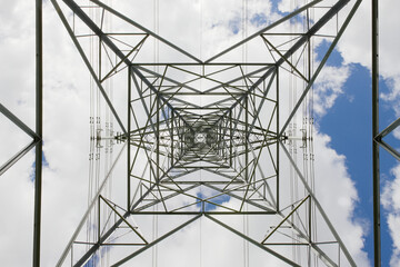 Abstract industrial background of pylon and power lines. Summertime.
