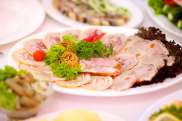 Restaurant dish of sliced meat