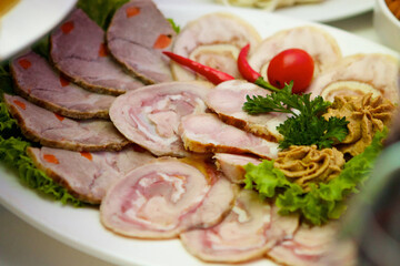 Restaurant dish of sliced meat
