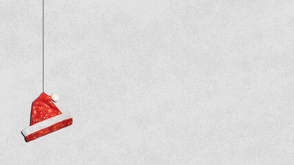 Red Santa hat weighs on a string.           