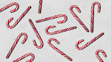 Christmas candy. Candy cane on a gray background.                       
