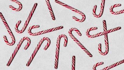 Christmas candy. Candy cane on a gray background.                                       