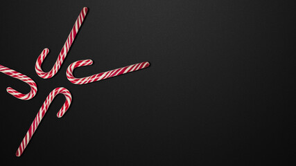 Candy cane. 4 candies on black background
