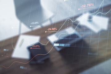 Double exposure of abstract creative statistics data hologram and modern desk with computer on background, analytics and forecasting concept