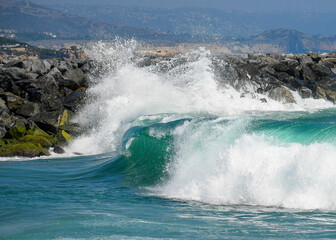 waves crashing on rocks
