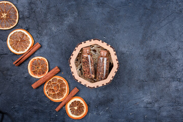 New Year's set for mulled wine in a wood box. Fragrant spices, orange peel, cinnamon sticks, badyan.