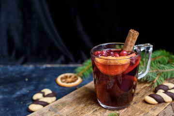Hot Mulled Wine for winter and Christmas on wooden table with copy space. Red Hot wine