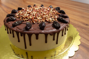 cake with chocolate, prunes and nuts