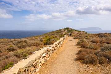 Path to the ancient ruins of Homer's Tomb in northern Ios. Cyclades Islands, Greece