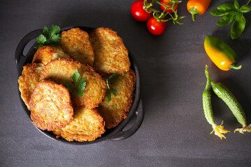 Potato Cakes. Vegetable fritters, latkes, hash browns. Vegetable pancakes. Flat lay, layout, overhead