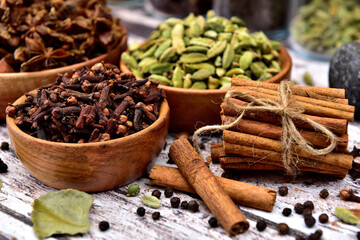 Bunch of spices on a wooden table