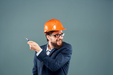 Male engineer orange hard hat construction industry emotions official