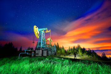 Oil platform in the night mountains