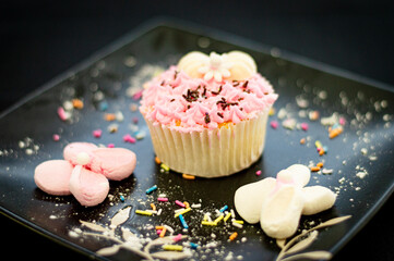 pink cupcake with icing 1