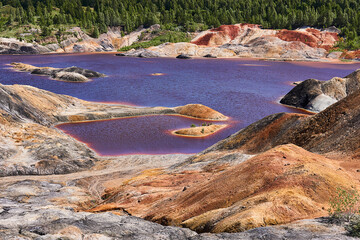 purple lake in old kaolin quarry