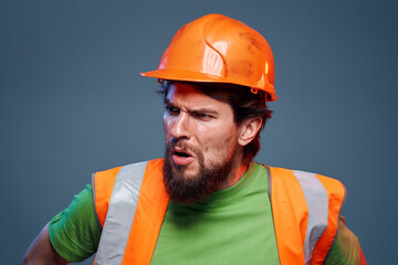 Emotional builders orange hard hat safety work fatigue blue background