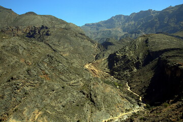 Mountainous landscape with the narrow steep path that runs through the canyon, Wadi Bani Awf, Al Rustaq, South Batinah Governorate of Oman, Oman