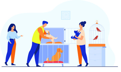 Pet store or animal shelter man taking puppy from cage buying or adopting dog volunteers helping to choose homeless animal for adoption.