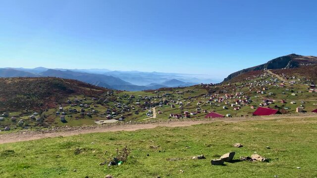 Footage of mountain village (high plateau) called "Sis Dagi" of Trabzon city of Black sea region in Turkey. Beautiful nature scene in sunny day. Camera moves forward.